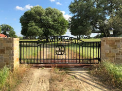 Double arch classic gate from Brenham Iron Works.