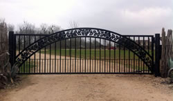 Double arch gate from Brenham Iron Works.