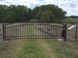 Double arch gate from Brenham Iron Works.